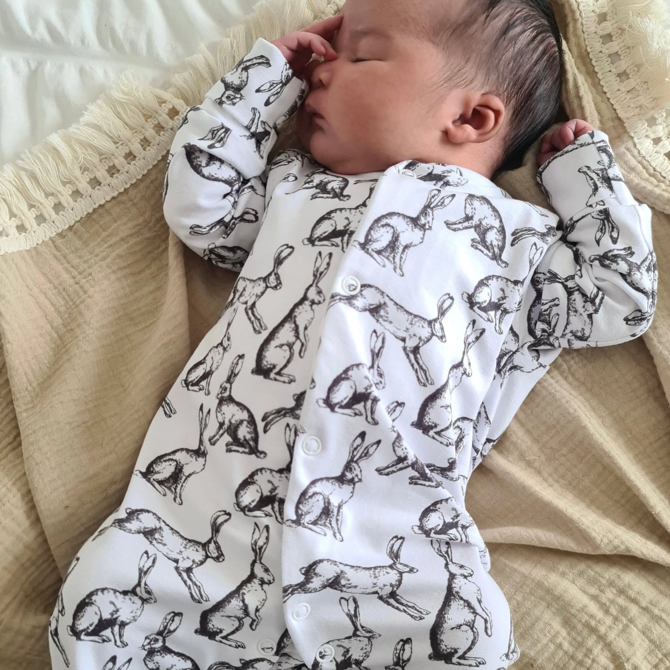 Hare print cotton sleepsuit