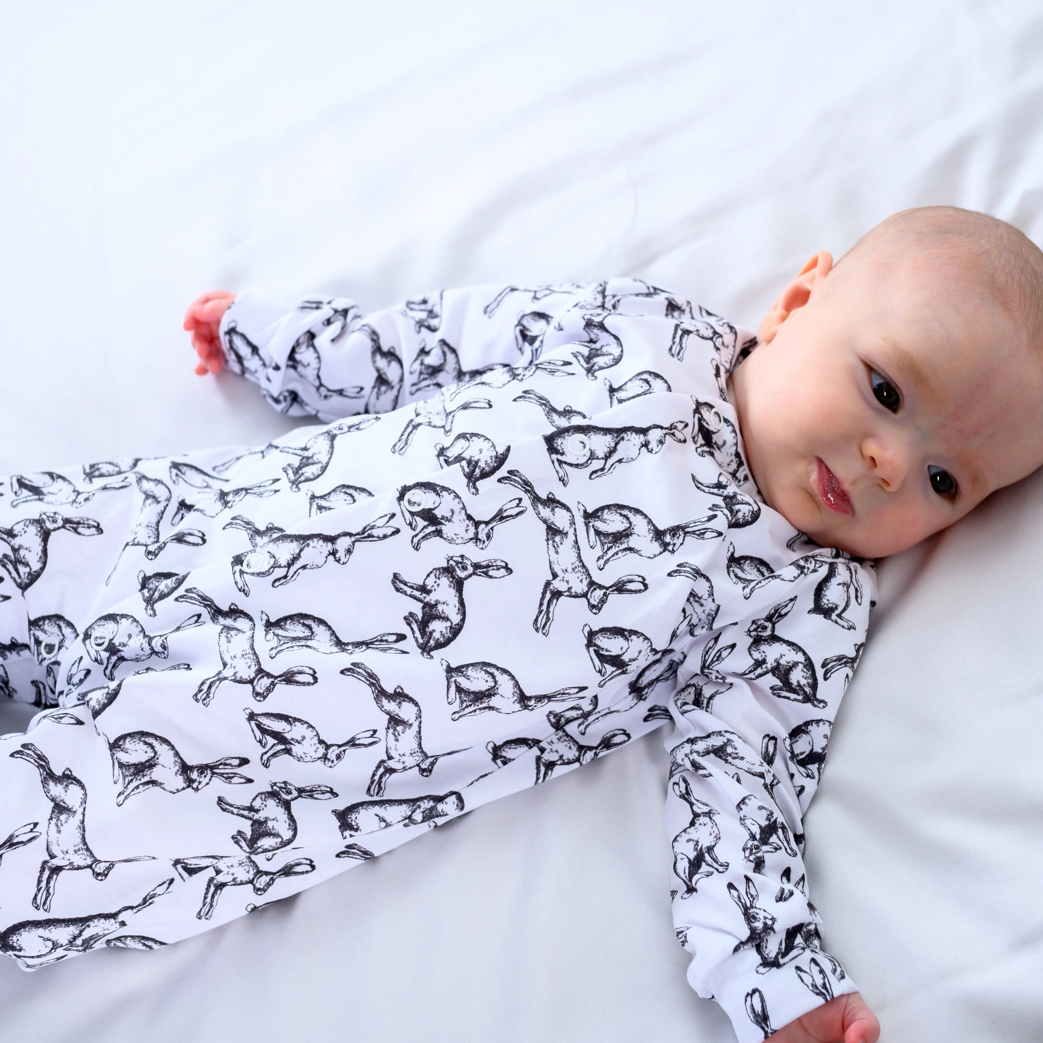 Hare print cotton sleepsuit