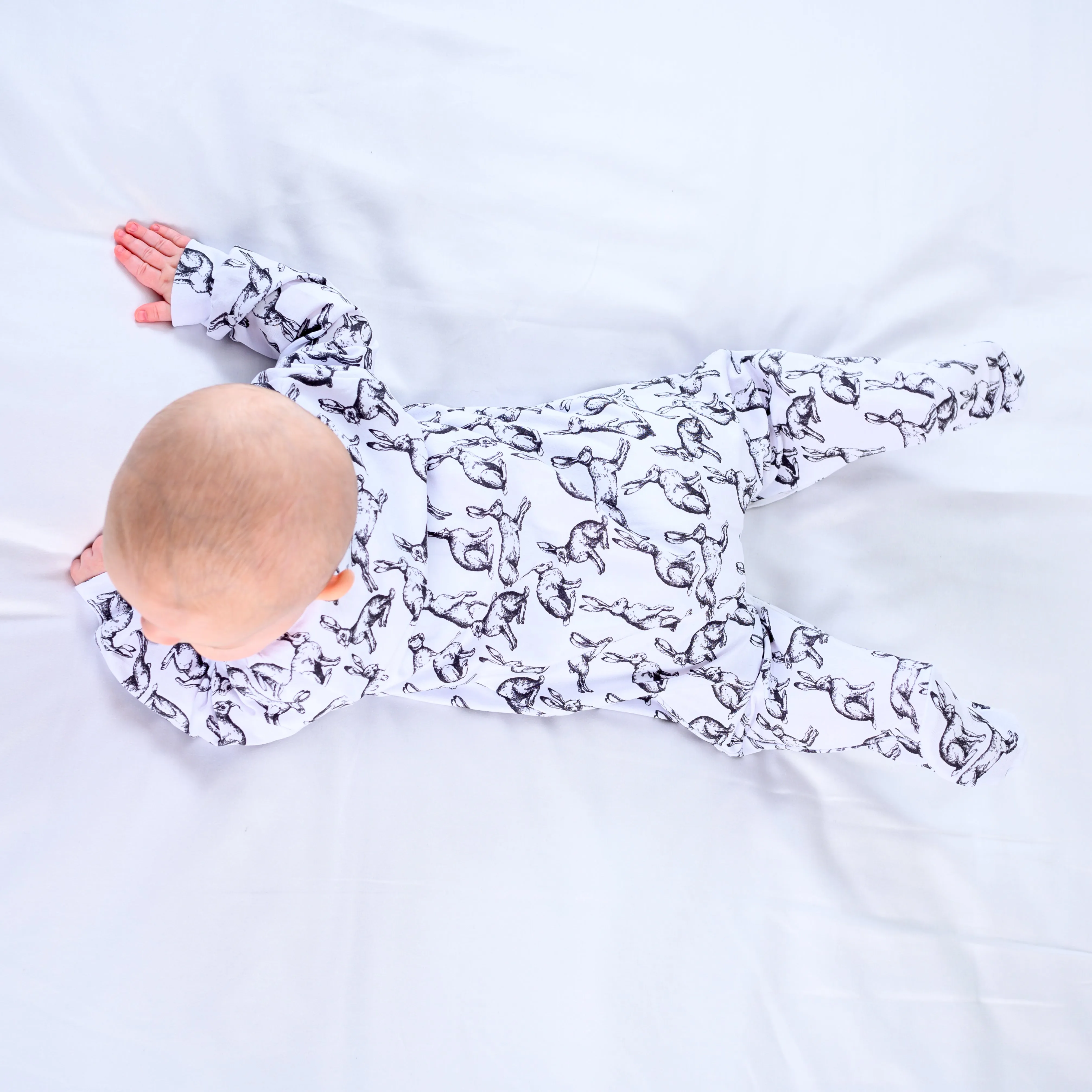 Hare print cotton sleepsuit